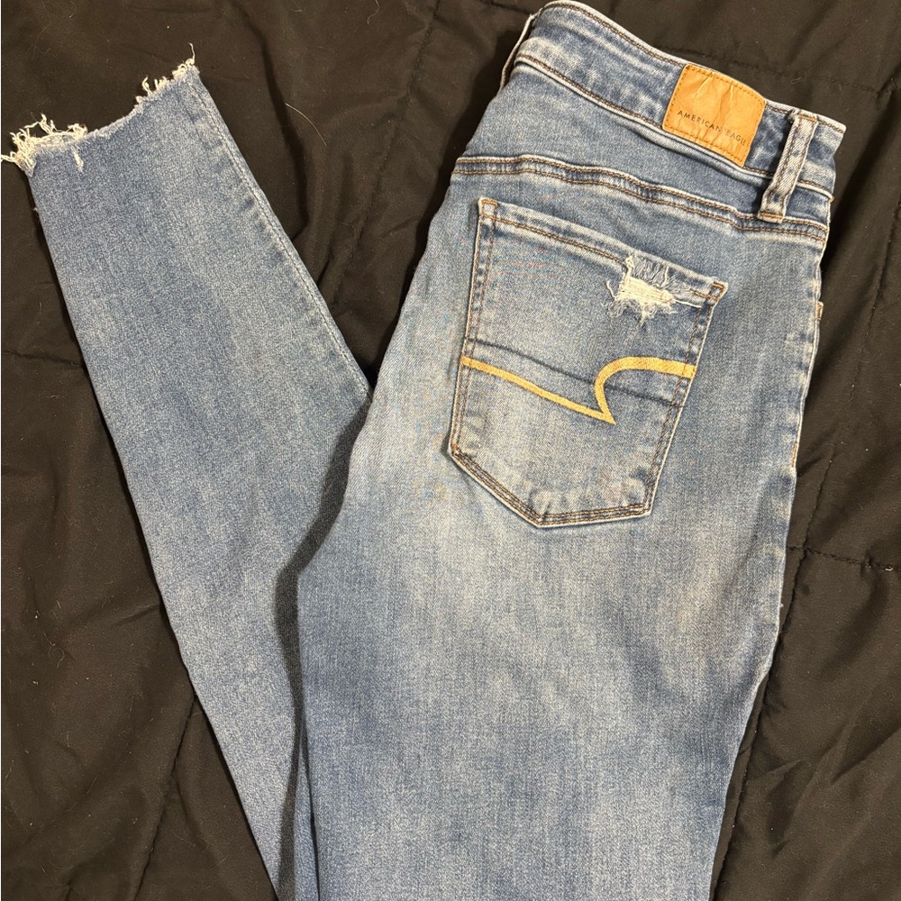 American Eagle Blue Skinny Jeans with Distressed Details